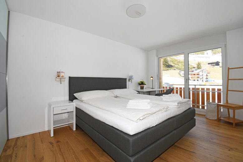 Master bedroom with a double bed