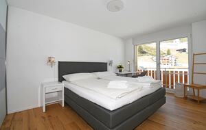 Master bedroom with a double bed