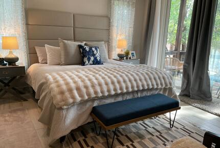 Guest Room downstairs bedroom with bath and private patio.