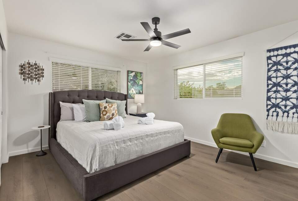 Master bedroom with King size bed and private bathroom