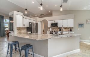 Canal-Side Comfort with Saltwater Pool - Cape Coral, Florida