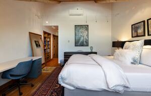 Upstairs guest suite with desk