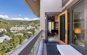 Balcony (entrance from living room and primary bedroom)