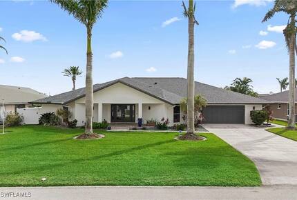 Spacious Canal-Front Escape with Pool & Outdoor Living - Cape Coral, Florida