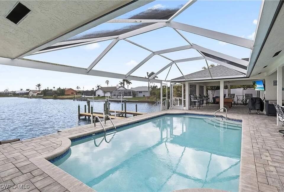Spacious Canal-Front Escape with Pool & Outdoor Living - Cape Coral, Florida