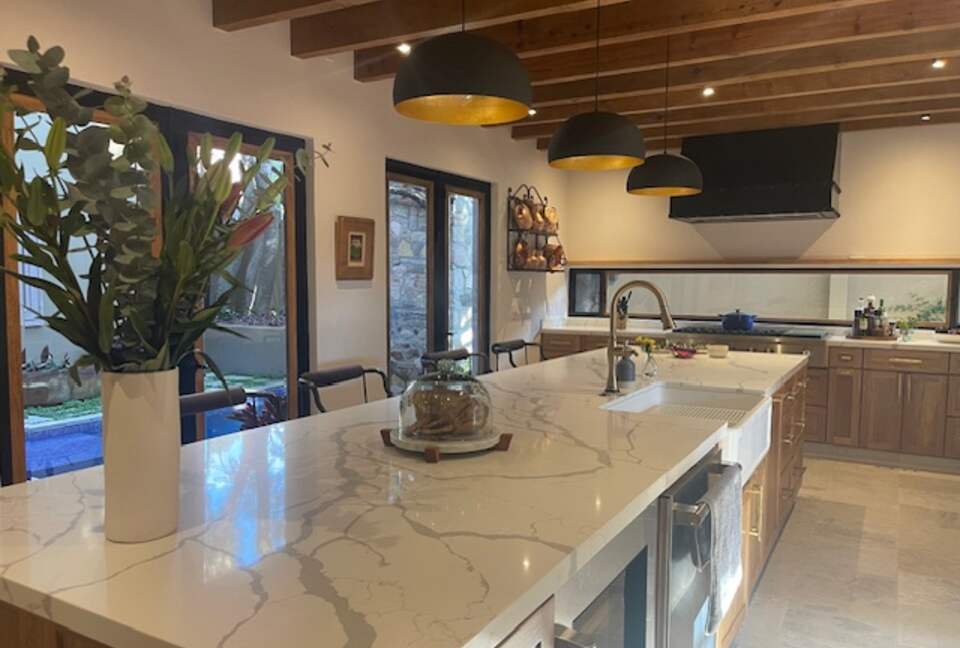 Large kitchen island with wine refrigerator