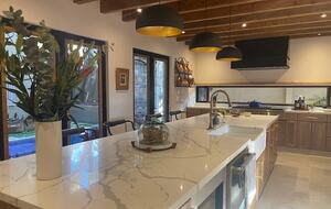 Large kitchen island with wine refrigerator