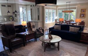 Great room w dining room overlooking oak trees in the corner