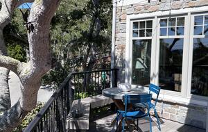 Smash deck with string lights off of kitchen and dining room