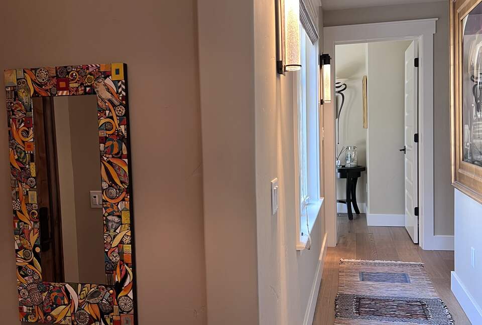 Hallway to 2 bedrooms and 1 bathroom