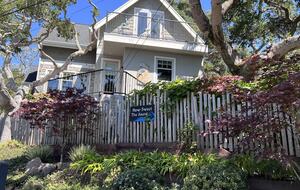Looking up at kitchen and primary 2nd floor bedroom balcony