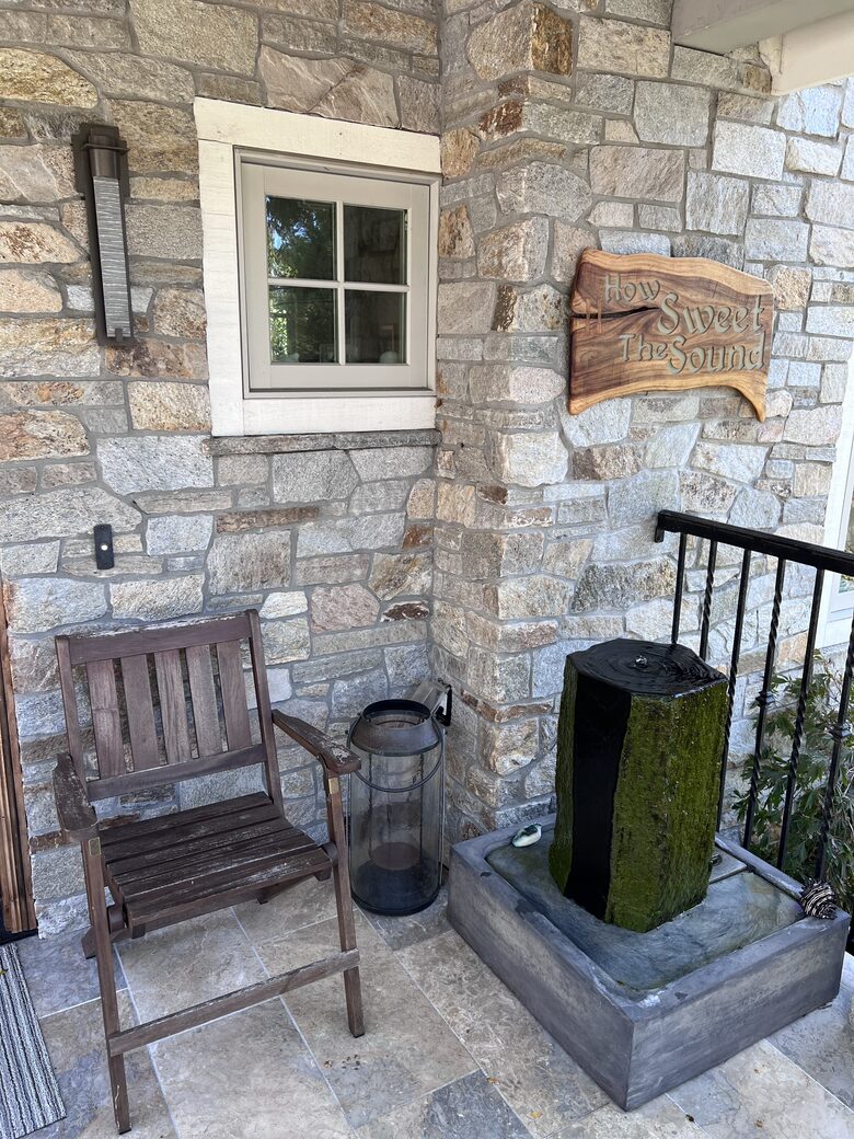 Front porch with basalt column water feature