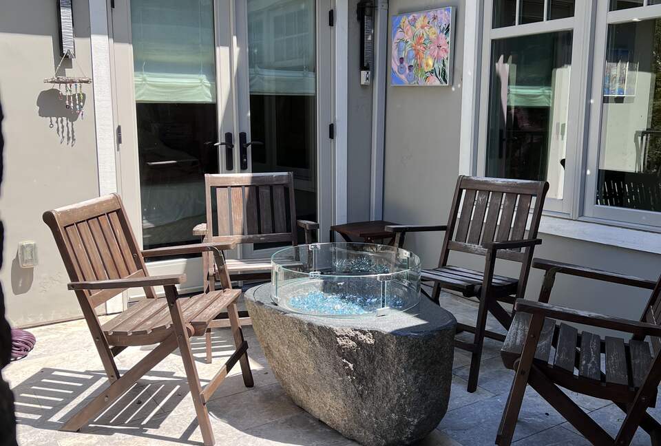 Small patio w gas fire bowl. S’mores anyone?