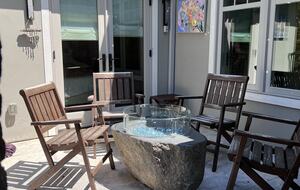 Small patio w gas fire bowl. S’mores anyone?