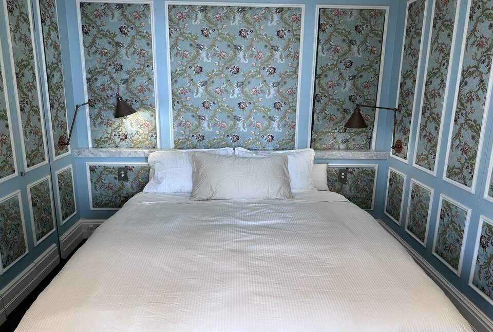 Master bedroom with king bed and powder room