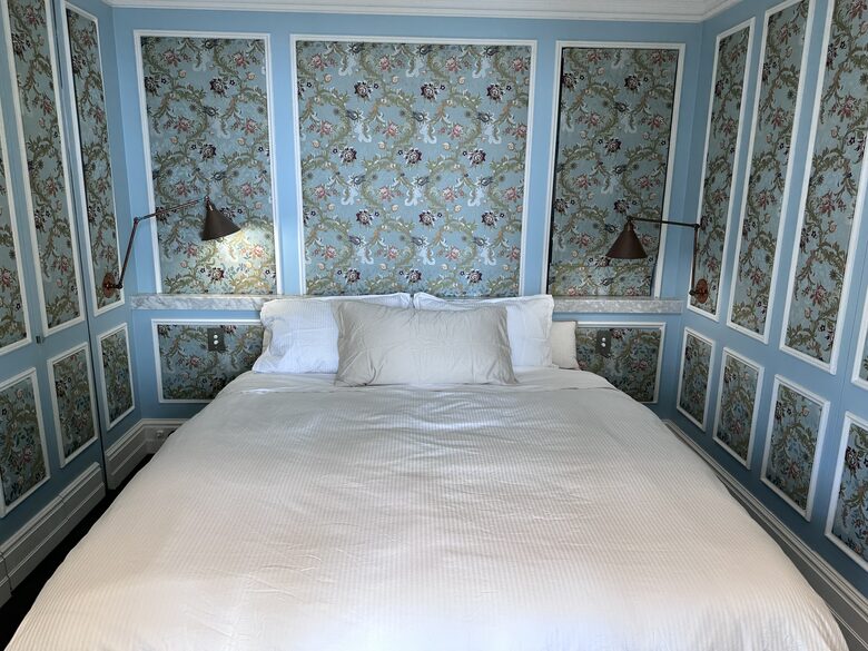 Master bedroom with king bed and powder room