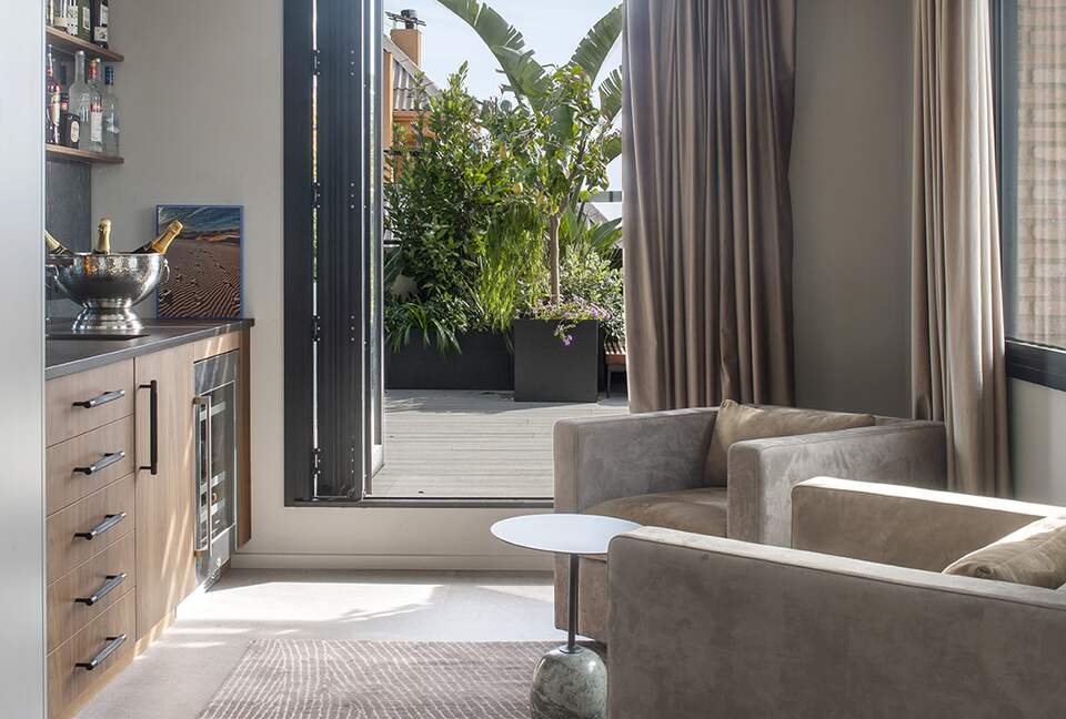 Bar area with accordion doors to outside