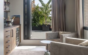 Bar area with accordion doors to outside