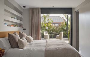 Primary Bedroom with accordion doors to outside