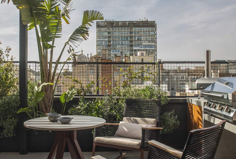 Coffee are by pizza oven and gas grill