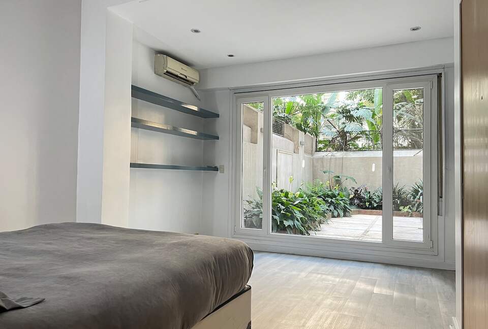 Charming 1950s Retreat with Sunroom & Garden in Retiro - Retiro, Argentina