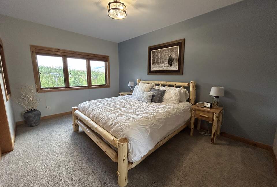 2nd bedroom with king bed and attached bath