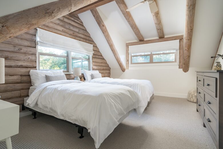 Upstairs bedroom shown as two twin XL