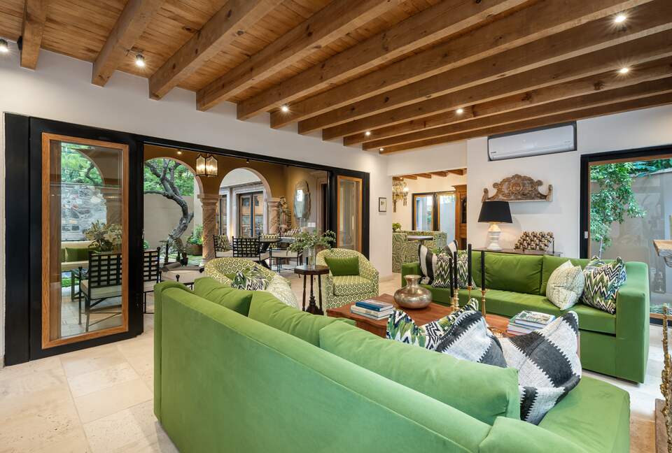 Living room overlooking patio and pool