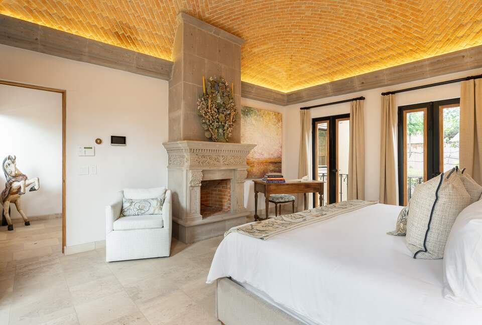 Primary bedroom with fireplace