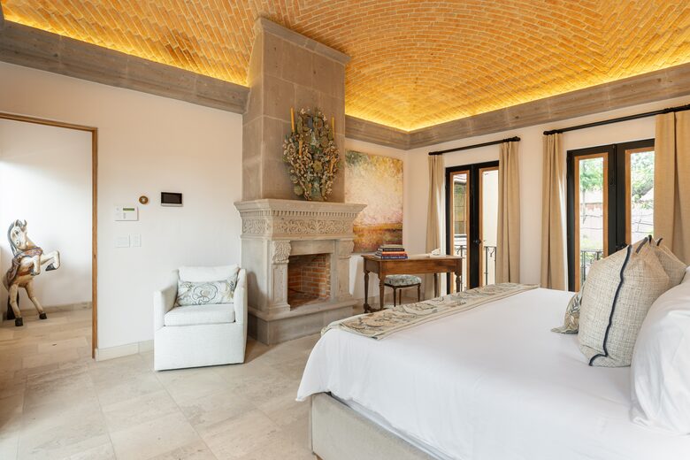 Primary bedroom with fireplace