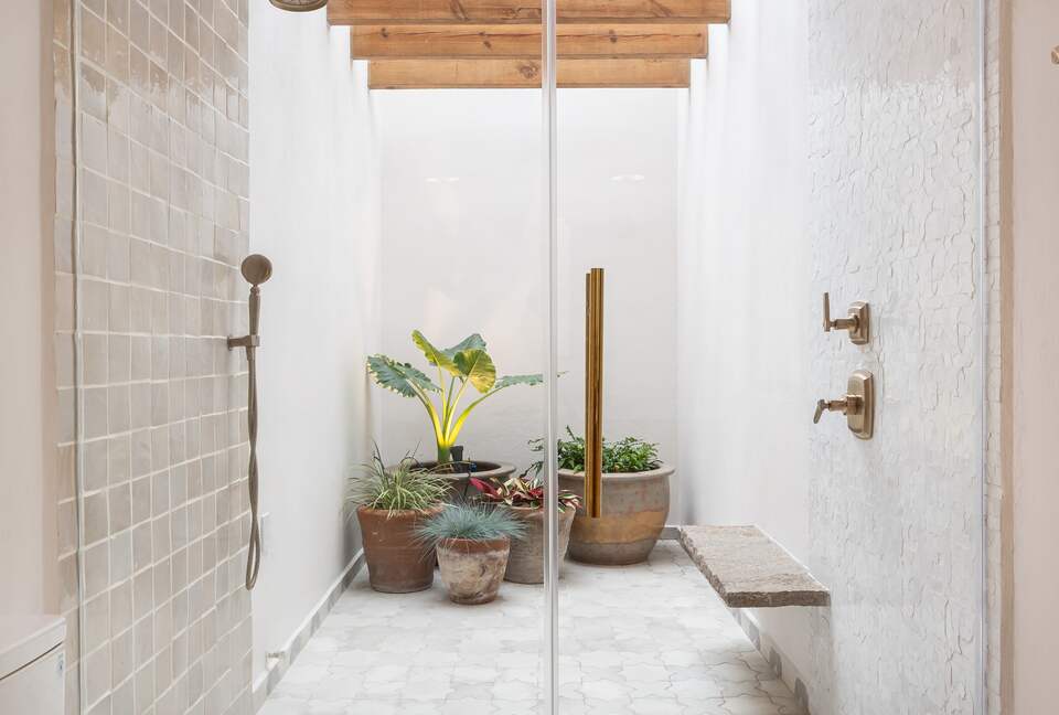 Shower with lush greenery