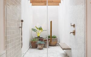 Shower with lush greenery