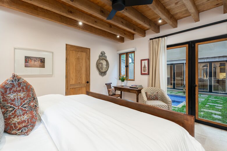 Guest bedroom overlooking the pool area