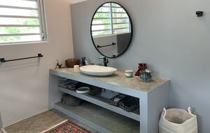 Private bathroom #1 with shower and toilet and closet