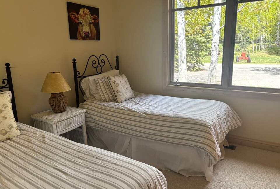 Second bedroom with two twin beds (option to convert into one king)