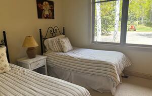Second bedroom with two twin beds (option to convert into one king)