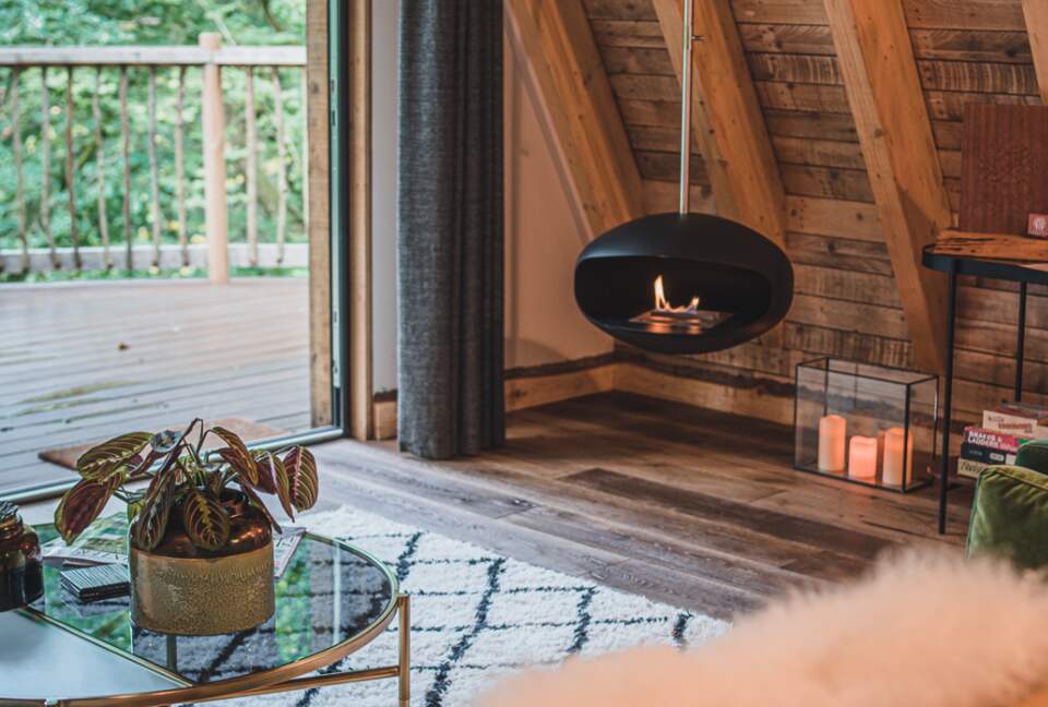 Lounge with full width Bifold Doors to the deck