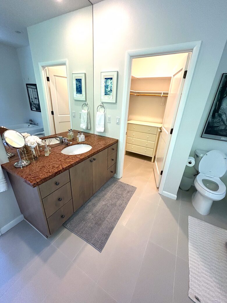 Master walk in closet and bathroom