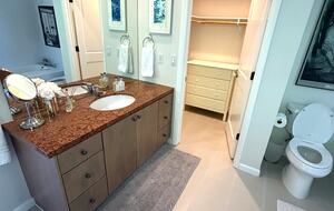 Master walk in closet and bathroom