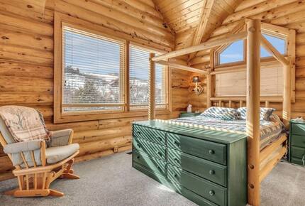 Main Floor goes room with Queen bed