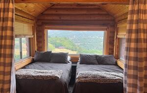 Upstairs loft area. Best views in the house! 2 double beds