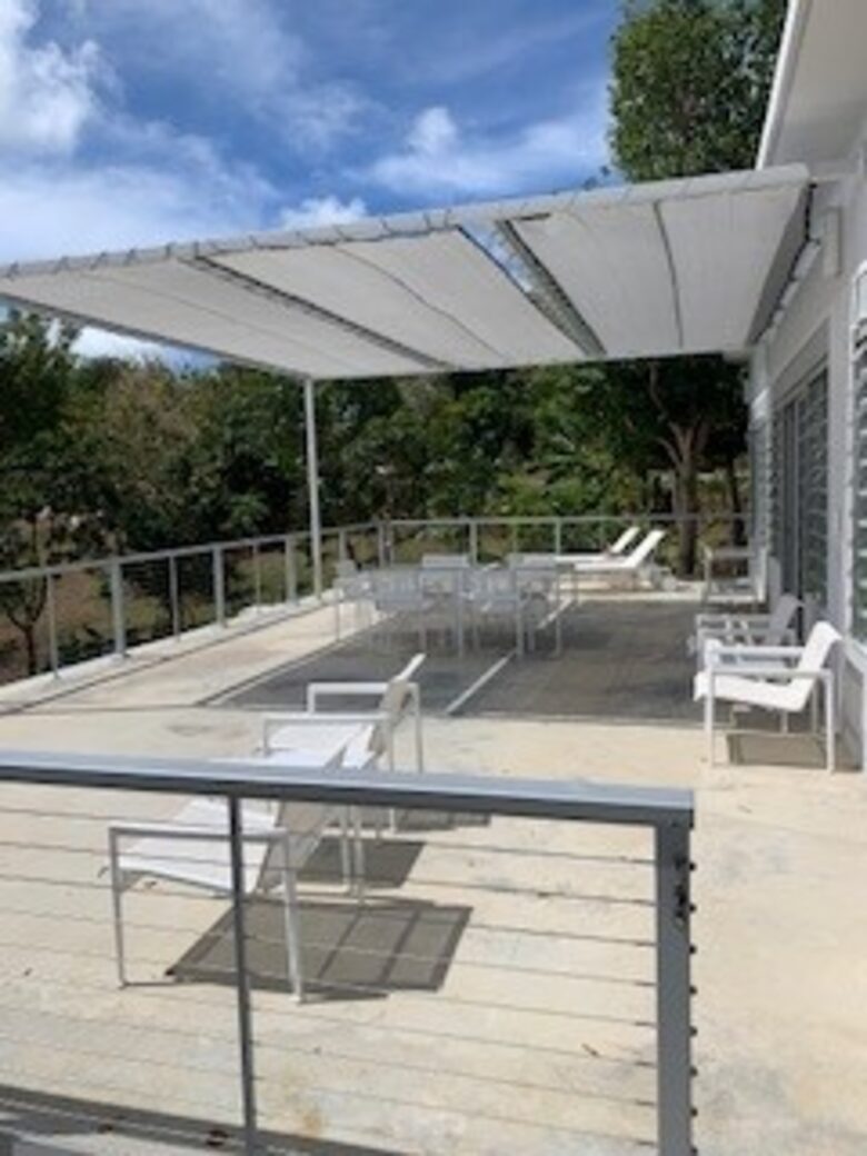 Balcony of the Casita with dining and loungers