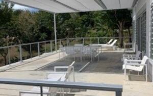 Balcony of the Casita with dining and loungers