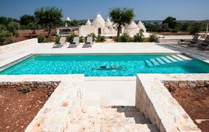 Elegant Trulli Living Amid Timeless Olive Groves - Cisternino, Italy