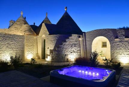 Elegant Trulli Living Amid Timeless Olive Groves - Cisternino, Italy