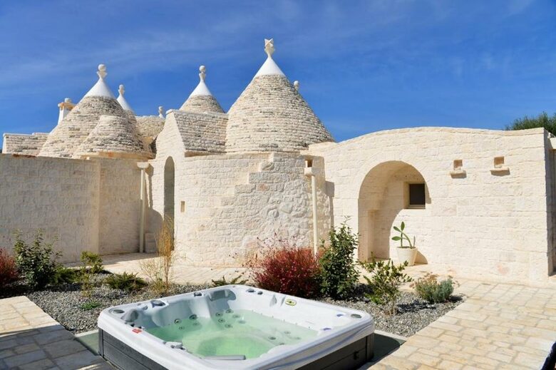 Elegant Trulli Living Amid Timeless Olive Groves - Cisternino, Italy