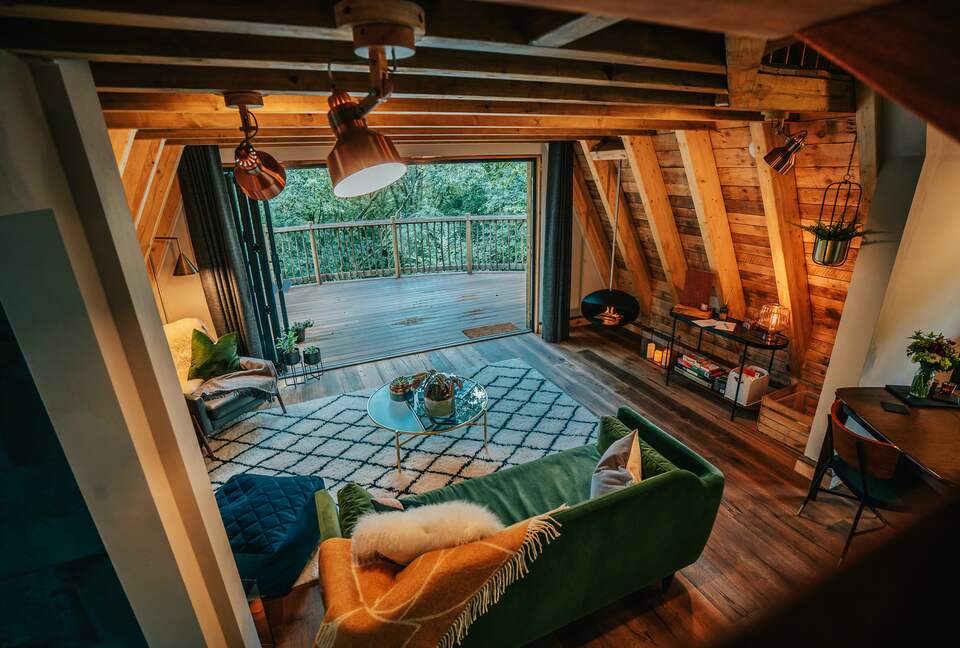 Open plan Kitchen/Lounge with Bifold Door to Wraparound Deck