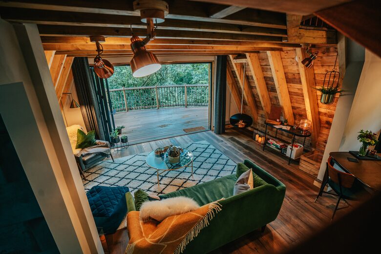 Open plan Kitchen/Lounge with Bifold Door to Wraparound Deck