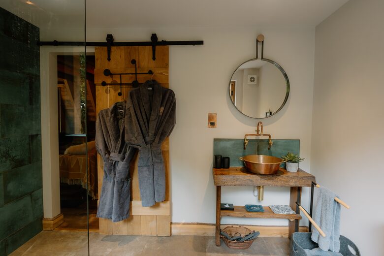 Full wet room bathroom with flushing WC + rainfall shower