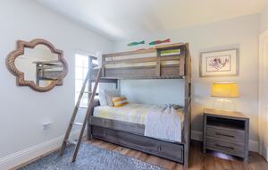 Guest bedroom bunk bed with futon